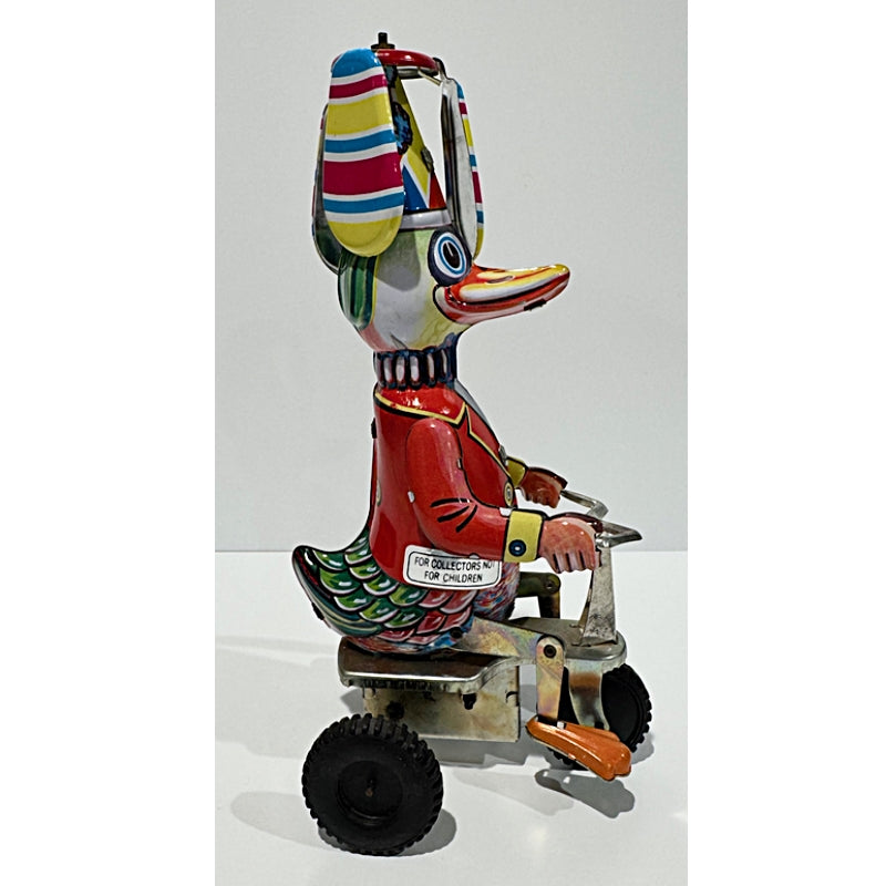 Vintage Mechanical wind-up Duck-on-Bike by Schylling