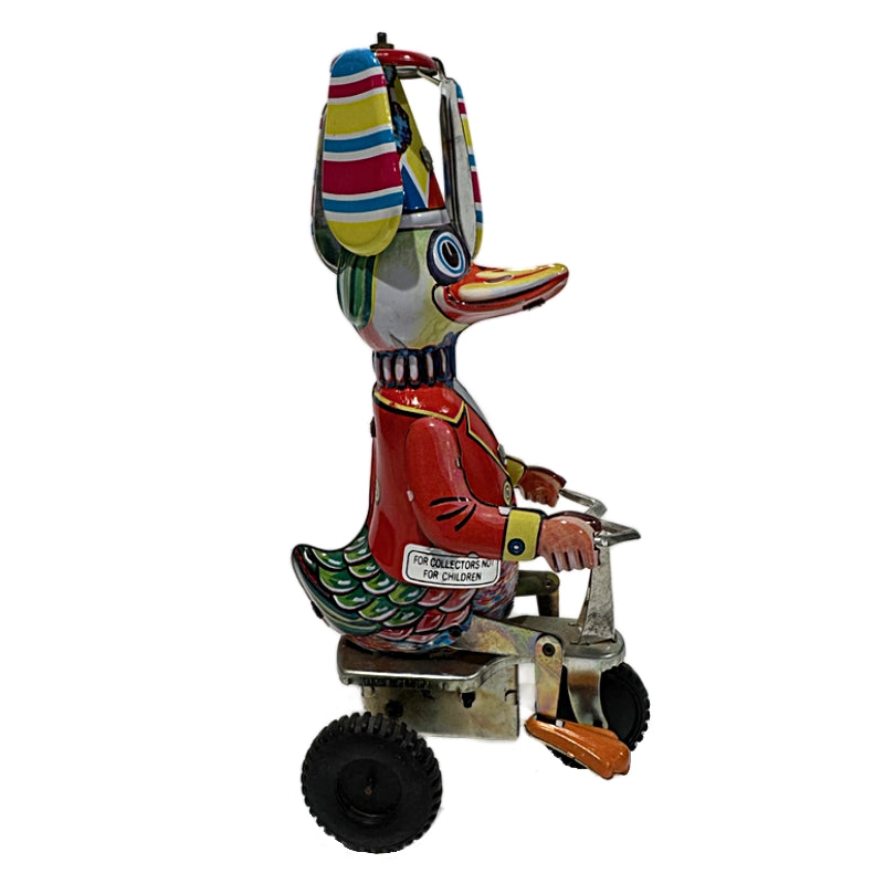 Vintage Mechanical wind-up Duck-on-Bike by Schylling